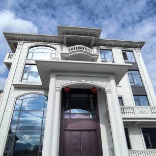 德阳白麻别墅外墙干挂石材效果示例