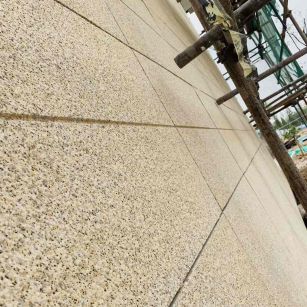 德阳 黄金麻花岗岩荔枝面外墙干挂石材效果示例