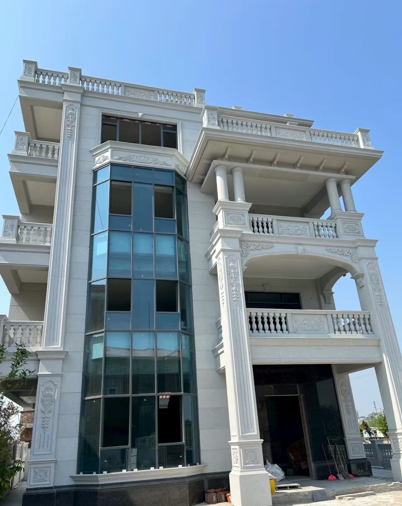 德阳 白麻花岗岩别墅外墙干挂效果展示